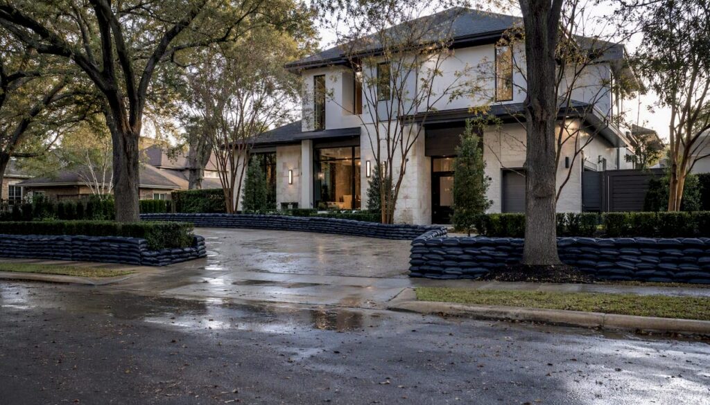 Houston home with sandbag flood barrier
