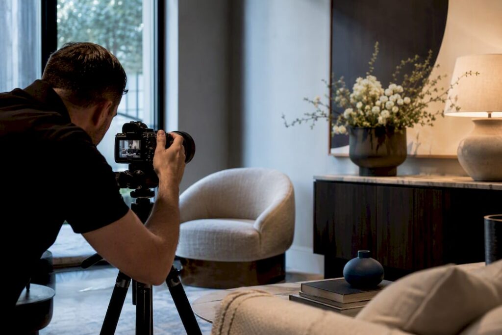 Photographer capturing a staged listing interior